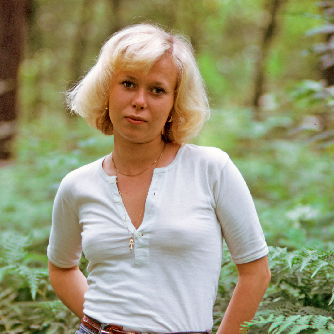 Portrait of Lena Andersson in forest.